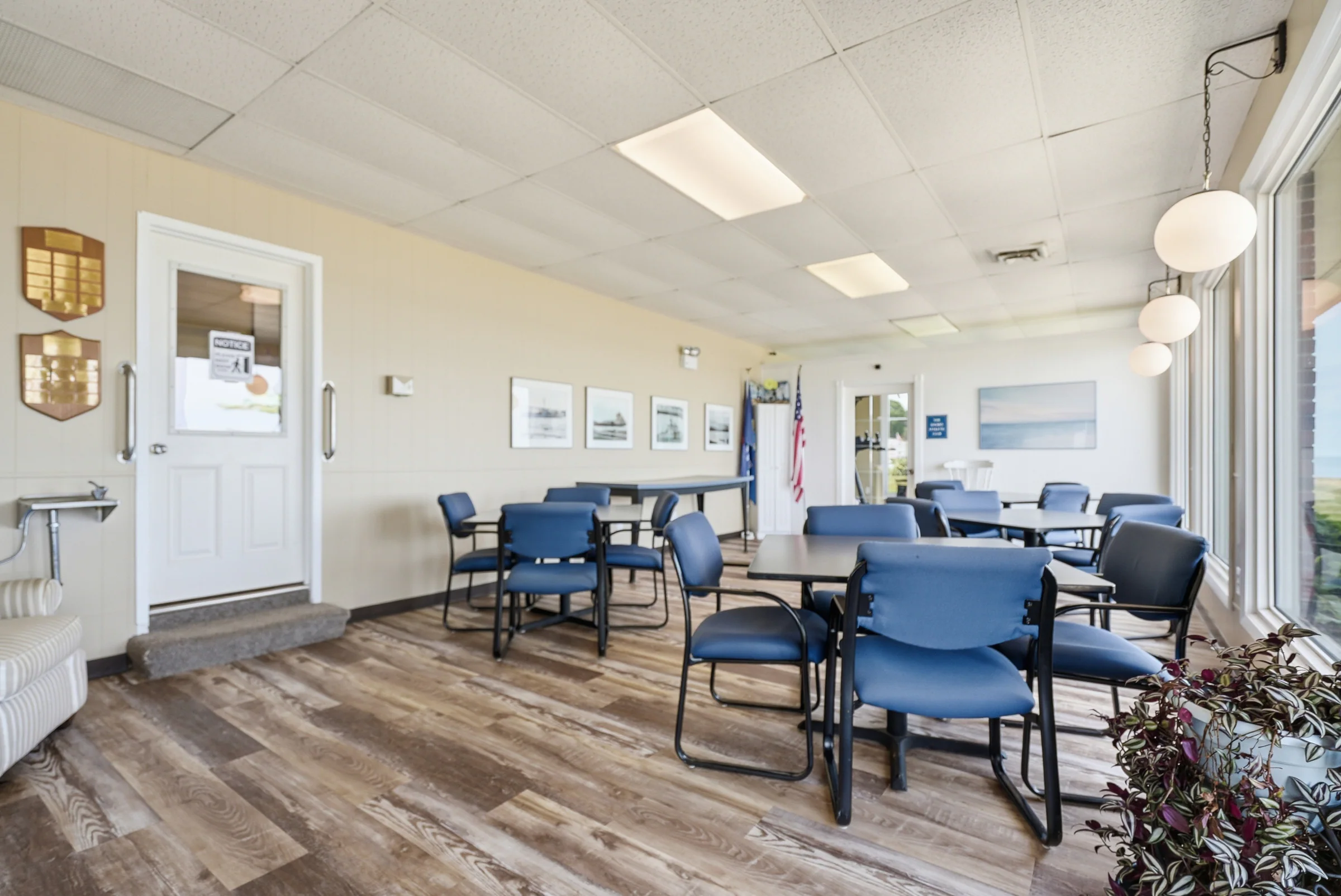 Bright resident gathering room in the Huron Shores community center