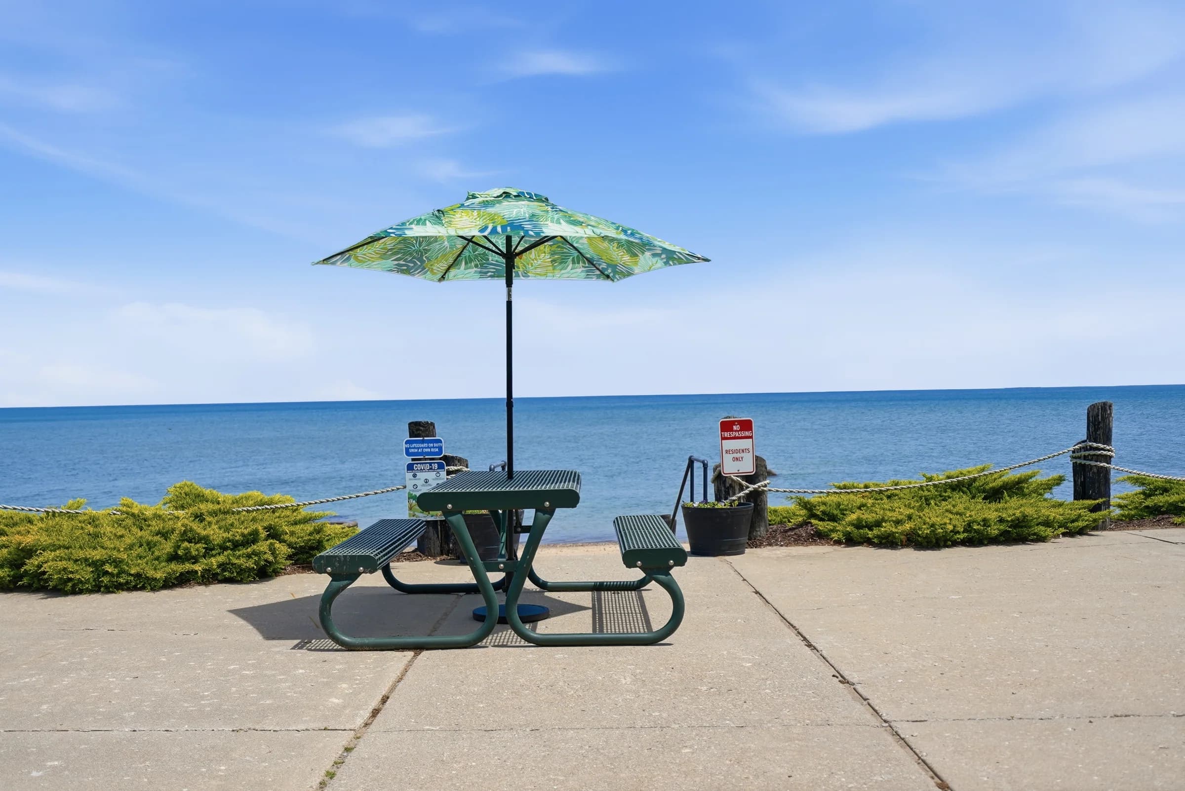 Shaded picnic table overlooking Lake Huron at Huron Shores